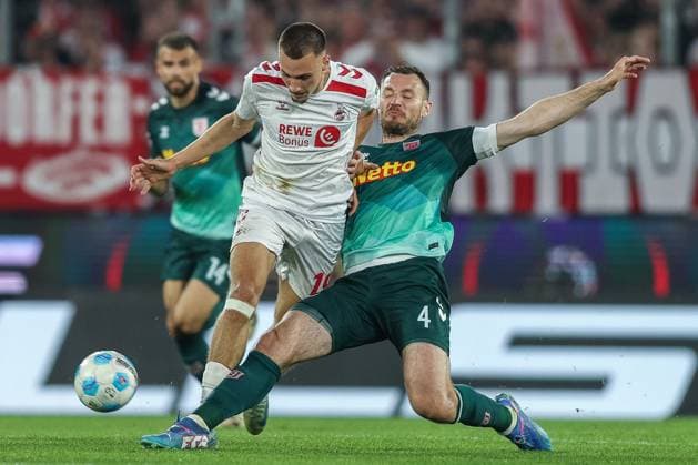 Soccer 2 Bundesliga 32 Matchday 1 FC Köln SSV Jahn Regensburg on 03 05 2025 at RheinEnergieStadion in Cologne Tim Lemperle Köln , left Florian Ballas Regensburg , right DFL regulations prohibit any use of photographs as image sequences and or quasi video xJRx