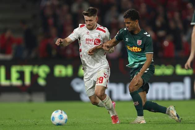 Jan Thielmann 1 FC Koeln and Bryan Hein SSV Jahn Regensburg battle for the ball during the 2 Bundesliga match between 1 FC Koeln and Jahn Regensburg at RheinEnergieStadion on May 03, 2025 in Cologne, Germany, Germany Photo by Oliver Kaelke DeFodi Images Jan Thielmann 1 FC Koeln and Bryan Hein SSV Jahn Regensburg battle for the ball during the 2 Bundesliga match between 1 FC Köln and Jahn Regensburg at RheinEnergieStadion on May 3, 2025 in Cologne, Germany Photo by Oliver Kaelke DeFodi Images DFB DFL REGULATIONS PROHIBIT ANY USE OF PHOTOGRAPHS AS IMAGE SEQUENCES AND OR QUASI VIDEO Photo by Oliver Kaelke DeFodi Images