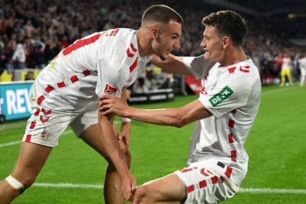 Tim Lemperle 1 FC Koeln and Eric Martel 1 FC Koeln celebrates after scoring his team™s first goal during the 2 Bundesliga match between 1 FC Koeln and Jahn Regensburg at RheinEnergieStadion on May 03, 2025 in Cologne, Germany, Germany Photo by Ralf Treese DeFodi Images Tim Lemperle 1 FC Koeln and Eric Martel 1 FC Koeln celebrates after scoring his team™s first goal during the 2 Bundesliga match between 1 FC Köln and Jahn Regensburg at RheinEnergieStadion on May 3, 2025 in Cologne, Germany Photo by Ralf Treese DeFodi Images DFB DFL REGULATIONS PROHIBIT ANY USE OF PHOTOGRAPHS AS IMAGE SEQUENCES AND OR QUASI VIDEO Photo by Ralf Treese DeFodi Images