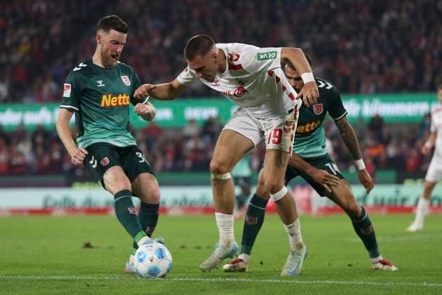 Christian Kuehlwetter SSV Jahn Regensburg , Tim Lemperle 1 FC Koeln and Robin Ziegele SSV Jahn Regensburg battle for the ball during the 2 Bundesliga match between 1 FC Köln and Jahn Regensburg at RheinEnergieStadion on May 3, 2025 in Cologne, Germany Photo by Oliver Kaelke DeFodi Images Christian Kuehlwetter SSV Jahn Regensburg , Tim Lemperle 1 FC Koeln and Robin Ziegele SSV Jahn Regensburg battle for the ball during the 2 Bundesliga match between 1 FC Köln and Jahn Regensburg at RheinEnergieStadion on May 3, 2025 in Cologne, Germany Photo by Oliver Kaelke DeFodi Images DFB DFL REGULATIONS PROHIBIT ANY USE OF PHOTOGRAPHS AS IMAGE SEQUENCES AND OR QUASI VIDEO Photo by Oliver Kaelke DeFodi Images