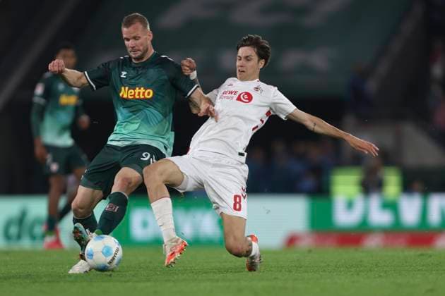 Eric Hottmann SSV Jahn Regensburg and Denis Huseinbasic 1 FC Koeln battle for the ball during the 2 Bundesliga match between 1 FC Köln and Jahn Regensburg at RheinEnergieStadion on May 03, 2025 in Cologne, Germany, Germany Photo by Oliver Kaelke DeFodi Images Eric Hottmann SSV Jahn Regensburg and Denis Huseinbasic 1 FC Koeln battle for the ball during the 2 Bundesliga match between 1 FC Köln and Jahn Regensburg at RheinEnergieStadion on May 3, 2025 in Cologne, Germany Photo by Oliver Kaelke DeFodi Images DFB DFL REGULATIONS PROHIBIT ANY USE OF PHOTOGRAPHS AS IMAGE SEQUENCES AND OR QUASI VIDEO Photo by Oliver Kaelke DeFodi Images