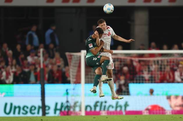 Bryan Hein SSV Jahn Regensburg and Eric Martel 1 FC Koeln battle for the ball during the 2 Bundesliga match between 1 FC Köln and Jahn Regensburg at RheinEnergieStadion on May 03, 2025 in Cologne, Germany, Germany Photo by Oliver Kaelke DeFodi Images Bryan Hein SSV Jahn Regensburg and Eric Martel 1 FC Koeln battle for the ball during the 2 Bundesliga match between 1 FC Köln and Jahn Regensburg at RheinEnergieStadion on May 3, 2025 in Cologne, Germany Photo by Oliver Kaelke DeFodi Images DFB DFL REGULATIONS PROHIBIT ANY USE OF PHOTOGRAPHS AS IMAGE SEQUENCES AND OR QUASI VIDEO Photo by Oliver Kaelke DeFodi Images
