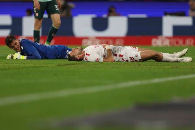 Goalkeeper Julian Pollersbeck SSV Jahn Regensburg and Imad Rondic 1 FC Koeln on the ground during the 2 Bundesliga match between 1 FC Köln and Jahn Regensburg at RheinEnergieStadion on May 03, 2025 in Cologne, Germany, Germany Photo by Oliver Kaelke DeFodi Images Goalkeeper Julian Pollersbeck SSV Jahn Regensburg and Imad Rondic 1 FC Koeln on the ground during the 2 Bundesliga match between 1 FC Köln and Jahn Regensburg at RheinEnergieStadion on May 3, 2025 in Cologne, Germany Photo by Oliver Kaelke DeFodi Images DFB DFL REGULATIONS PROHIBIT ANY USE OF PHOTOGRAPHS AS IMAGE SEQUENCES AND OR QUASI VIDEO Photo by Oliver Kaelke DeFodi Images