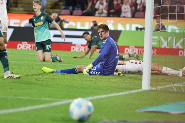 GER, 2 FBL, 1 FC Koeln vs SSV Jahn Regensburg 03 05 2025, Rheinenergie Stadion, Koeln, GER, 2 FBL, 1 FC Koeln vs SSV Jahn Regensburg, in the picture Julian Pollersbeck goalkeeper Regensburg 23 , sits in front of the goal the ball rolls past him nordphotoxGmbHx xMeuter nph00351