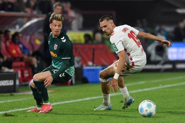 Christian Viet Jahn Regensburg and Tim Lemperle 1 FC Koeln battle for the ball during the 2 Bundesliga match between 1 FC Köln and Jahn Regensburg at RheinEnergieStadion on May 03, 2025 in Cologne, Germany, Germany Photo by Ralf Treese DeFodi Images Christian Viet Jahn Regensburg and Tim Lemperle 1 FC Koeln battle for the ball during the 2 Bundesliga match between 1 FC Köln and Jahn Regensburg at RheinEnergieStadion on May 3, 2025 in Cologne, Germany Photo by Ralf Treese DeFodi Images DFB DFL REGULATIONS PROHIBIT ANY USE OF PHOTOGRAPHS AS IMAGE SEQUENCES AND OR QUASI VIDEO Photo by Ralf Treese DeFodi Images