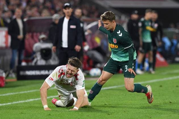 Jan Thielmann 1 FC Koeln and Anssi Suhonen Jahn Regensburg battle for the ball during the 2 Bundesliga match between 1 FC Koeln and Jahn Regensburg at RheinEnergieStadion on May 03, 2025 in Cologne, Germany, Germany Photo by Ralf Treese DeFodi Images Jan Thielmann 1 FC Koeln and Anssi Suhonen Jahn Regensburg battle for the ball during the 2 Bundesliga match between 1 FC Köln and Jahn Regensburg at RheinEnergieStadion on May 3, 2025 in Cologne, Germany Photo by Ralf Treese DeFodi Images DFB DFL REGULATIONS PROHIBIT ANY USE OF PHOTOGRAPHS AS IMAGE SEQUENCES AND OR QUASI VIDEO Photo by Ralf Treese DeFodi Images