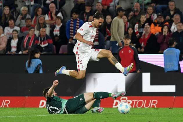 Christian Kuehlwetter Jahn Regensburg and Max Finkgraefe 1 FC Koeln battle for the ball during the 2 Bundesliga match between 1 FC Köln and Jahn Regensburg at RheinEnergieStadion on May 03, 2025 in Cologne, Germany, Germany Photo by Ralf Treese DeFodi Images Christian Kuehlwetter Jahn Regensburg and Max Finkgraefe 1 FC Koeln battle for the ball during the 2 Bundesliga match between 1 FC Köln and Jahn Regensburg at RheinEnergieStadion on May 3, 2025 in Cologne, Germany Photo by Ralf Treese DeFodi Images DFB DFL REGULATIONS PROHIBIT ANY USE OF PHOTOGRAPHS AS IMAGE SEQUENCES AND OR QUASI VIDEO Photo by Ralf Treese DeFodi Images