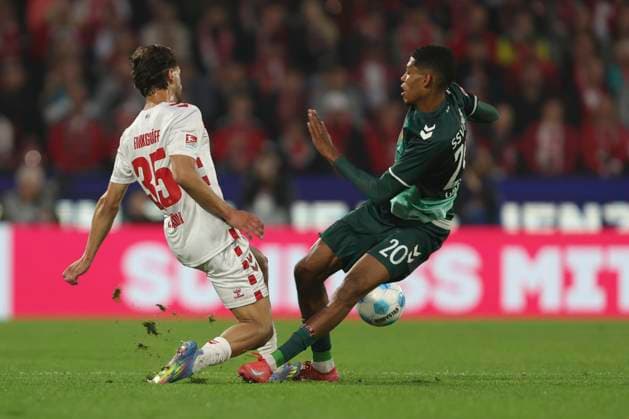 Max Finkgraefe 1 FC Koeln and Noah Ganaus SSV Jahn Regensburg battle for the ball during the 2 Bundesliga match between 1 FC Koeln and Jahn Regensburg at RheinEnergieStadion on May 03, 2025 in Cologne, Germany, Germany Photo by Oliver Kaelke DeFodi Images Max Finkgraefe 1 FC Koeln and Noah Ganaus SSV Jahn Regensburg battle for the ball during the 2 Bundesliga match between 1 FC Köln and Jahn Regensburg at RheinEnergieStadion on May 3, 2025 in Cologne, Germany Photo by Oliver Kaelke DeFodi Images DFB DFL REGULATIONS PROHIBIT ANY USE OF PHOTOGRAPHS AS IMAGE SEQUENCES AND OR QUASI VIDEO Photo by Oliver Kaelke DeFodi Images