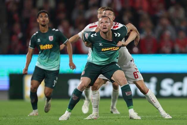 Eric Hottmann SSV Jahn Regensburg and Eric Martel 1 FC Koeln battle for the ball during the 2 Bundesliga match between 1 FC Köln and Jahn Regensburg at RheinEnergieStadion on May 03, 2025 in Cologne, Germany, Germany Photo by Oliver Kaelke DeFodi Images Eric Hottmann SSV Jahn Regensburg and Eric Martel 1 FC Koeln battle for the ball during the 2 Bundesliga match between 1 FC Köln and Jahn Regensburg at RheinEnergieStadion on May 3, 2025 in Cologne, Germany Photo by Oliver Kaelke DeFodi Images DFB DFL REGULATIONS PROHIBIT ANY USE OF PHOTOGRAPHS AS IMAGE SEQUENCES AND OR QUASI VIDEO Photo by Oliver Kaelke DeFodi Images