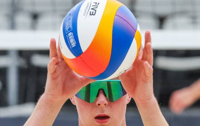 (250504) -- LAGUNA PROVINCE, May 4, 2025 -- Olivers Bulgacs of Latvia competes during the men s semifinal match between Lubos Nemec Adrian Petruf of Slovakia and Olivers Bulgacs Markuss Graudins of Latvia at the Volleyball World Beach Pro Tour Futures in Laguna Province, the Philippines, May 4, 2025. ) (SP)PHILIPPINES-LAGUNA PROVINCE-VOLLEYBALL WORLD BEACH PRO TOUR FUTURES ROUELLExUMALI 