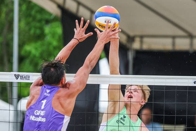 (250504) -- LAGUNA PROVINCE, May 4, 2025 -- Olivers Bulgacs (R) of Latvia competes against Stavros Ntallas of Greece during the men s 3rd place match between Stavros Ntallas Dimitrios Chatzinikolaou of Greece and Olivers Bulgacs Markuss Graudins of Latvia at the Volleyball World Beach Pro Tour Futures in Laguna Province, the Philippines, May 4, 2025. ) (SP)PHILIPPINES-LAGUNA PROVINCE-VOLLEYBALL WORLD BEACH PRO TOUR FUTURES ROUELLExUMALI 