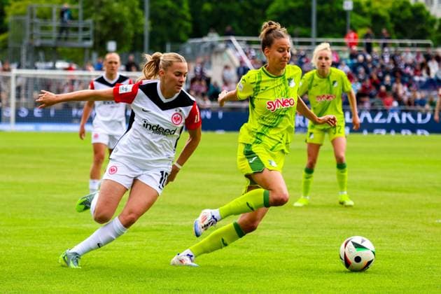 Frankfurt, Germany 04 May 2025 1 BL Women 2024 2025 Eintracht Frankfurt vs TSG Hoffenheim In the picture from left in a duel Laura Freigag Eintracht Frankfurt and Franziska Harsch TSG Hoffenheim DFB regulations prohibit any use of photographs as image sequences and or quasi video Stadion am Brentanobad Hessen Copyright: xFotostandx xFantinix