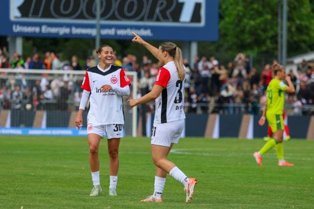 Frankfurt, Germany 04 May 2025 1 BL Women 2024 2025 Eintracht Frankfurt vs TSG Hoffenheim In the picture from left the second goal scorer Tanja Pawollek Eintracht Frankfurt makes the goal to 3 1 for Eintracht Frankfurt and cheers with Carlotta Wamser Eintracht Frankfurt DFB regulations prohibit any use of photographs as image sequences and or quasi video Stadion am Brentanobad Hessen Copyright: xFotostandx xFantinix