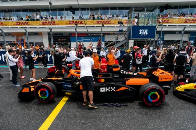 Australian Formula One driver Oscar Piastri of McLaren F1 Team checks out a Lego car during the divers parade at the Formula One Miami Grand Prix at the Miami International Autodrome in Miami Gardens, Florida on Sunday, May 4, 2025.  MIA2025050434 GREGxNASH