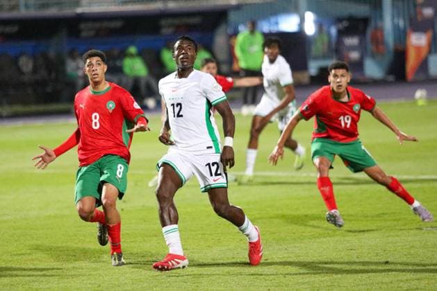 CAIRO, EGYPT - MAY 4: Ayman Arguigue of Morocco and Precious Benjamin and of Nigeria during the men U20 Caf Africa Cup of Nations match between Morocco and Nigeria at 30 June Stadium on May 4, 2025 in Cairo, Egypt. Photo by Ugbodaga Irabor Kennedy Dagashotz Copyright: xx