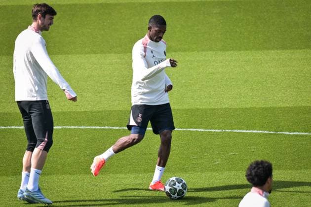 PSG Training before facing Arsenal - FA Paris Saint-Germain’s forward Ousmane Dembele warms up during a training session at the PSG Campus on May 6, 2025, before the UEFA Champions League football match between Paris Saint-Germain and Arsenal FC at the Parc des Princes Stadium in Paris on May 7, 2025. Photo by Firas Abdullah ABACAPRESS.COM Paris Ile-de-France France  Copyright: xAbdullahxFiras ABACAx