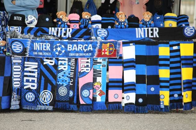 May 6, 2025, Milan, Lombardy, Italy: Merchandising stand selling customized scarfs for the UEFA 2024 25 Semi-Final second leg game between INTER and BARCELONA at the Giuseppe Meazza Stadium in Milan, Italy Milan Italy - ZUMAc179 20250506_zep_c179_007 Copyright: xMickaelxChavetx