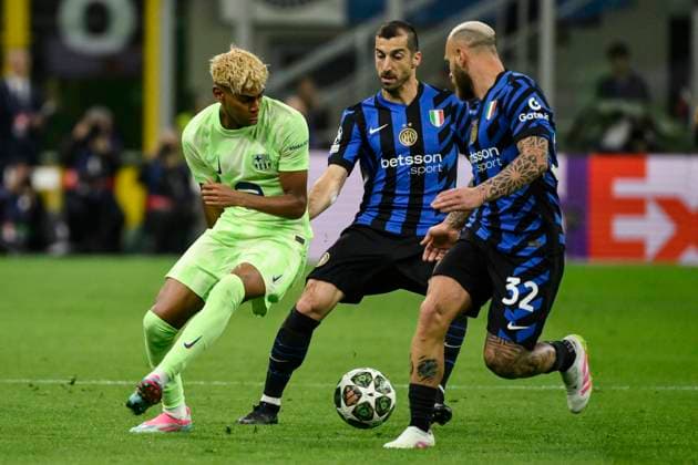 Lamine Yamal of Barcelona, Henrix Mkhitaryan and Federico Dimarco of FC Internazionale during the UEFA Champions League 2024 2025 semifinal between FC Internazionale and FC Barcelona, Barca at San Siro stadium in Milano (Italy), May 6, 2025. AndreaxStaccioli