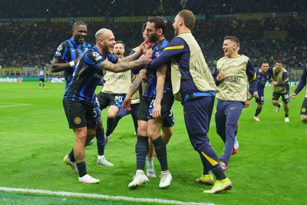 Inter Milan s Hakan Calhanoglu celebrates after scoring 2-0 during the Uefa Champions League soccer match between Inter and Barcelona at San Siro Stadium in Milan , North Italy - Tuesday May 06, 2025 . - Soccer  Copyright: xSpada LaPressex
