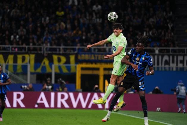 6th May 2025; Giuseppe Meazza, Milan, Italy; Champions League Semi Final, 2nd Leg Football, Inter Milan versus Barcelona FC; Gerard Martin wins the header above Bisseck of Inter  ActionPlus12783314 JomaxGarcia