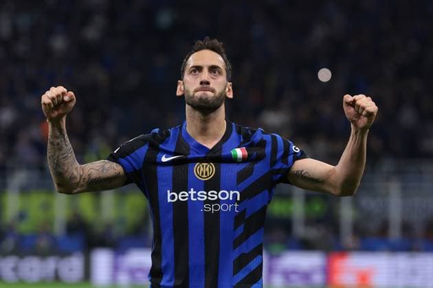 Milan, Italy, 6th May 2025. Hakan Calhanoglu of FC Internazionale celebrates after scoring a penalty to give the side a 2-0 lead during the Internazionale vs FC Barcelona, Barca UEFA Champions League match at Giuseppe Meazza, Milan. Picture credit should read: Jonathan Moscrop Sportimage EDITORIAL USE ONLY. No use with unauthorised audio, video, data, fixture lists, club league logos or live services. Online in-match use limited to 120 images, no video emulation. No use in betting, games or single club league player publications. SPI_059_JM_INTER_BARCA_UCL SPI-3886-0059