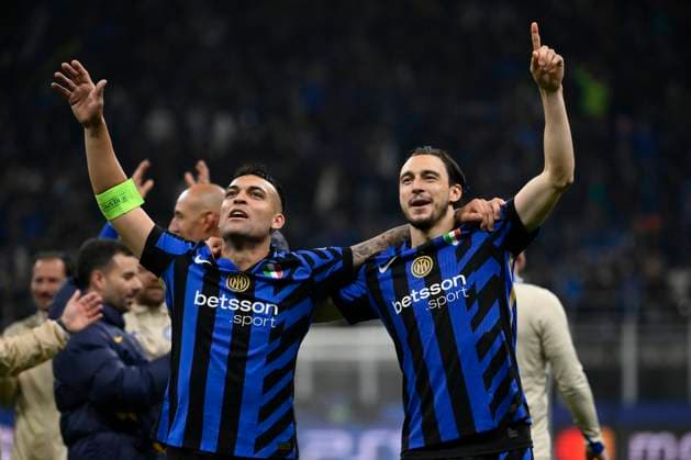 Lautaro Martinez and Matteo Darmian of FC Internazionale celebrate at the end of the UEFA Champions League 2024 2025 semifinal between FC Internazionale and FC Barcelona, Barca at San Siro stadium in Milano (Italy), May 6, 2025. AndreaxStaccioli