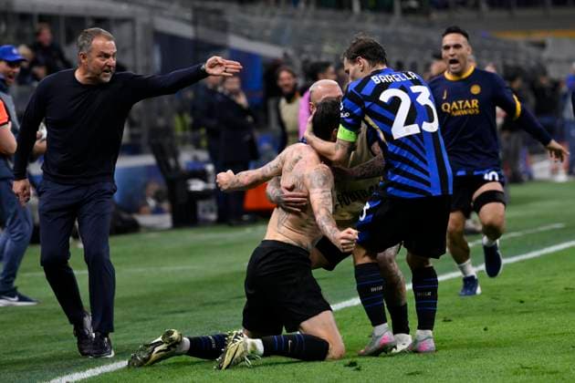 Francesco Acerbi of FC Internazionale celebrates in front of Hansi Flick, head coach of Barcelona, after scoring the goal of 3-3 during the UEFA Champions League 2024 2025 semifinal between FC Internazionale and FC Barcelona, Barca at San Siro stadium in Milano (Italy), May 6, 2025. AndreaxStaccioli