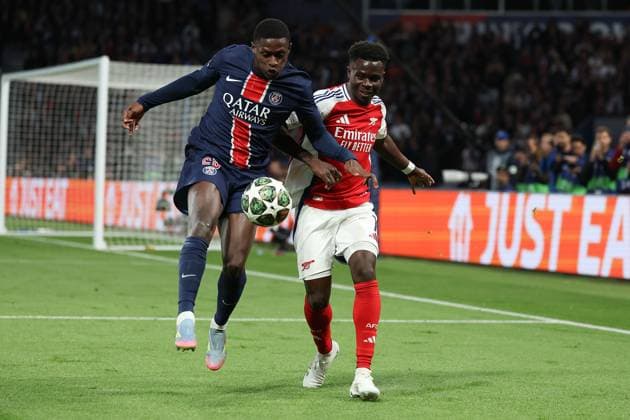 Paris, Parc des Princes 7 05 2025 xJFx UEFA Champions League 2024 25 semi-final second leg Paris Saint Germain Arsenal FC v l , Nuno Mendes Paris Saint Germain , Bukayo Saka Arsenal FC , duel, action, action, battles for the ball Copyright: JoaquimxFerreira