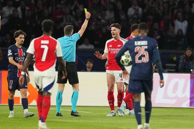 Declan Rice of Arsenal receives a yellow card Paris Saint-Germain v Arsenal, UEFA Champions League, Semi Final, Second Leg, Football, Parc des Princes, Paris, France - 07 May 2025 EDITORIAL USE ONLY No use with unauthorised audio, video, data, fixture lists, club league logos or live services. Online in-match use limited to 120 images, no video emulation. No use in betting, games or single club league player publications. Copyright: xDavexWinter Shutterstockx 15288067aq
