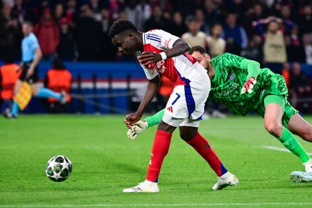 FOOTBALL : PSG vs Arsenal - Ligue des Champions - 07 05 2025 Bukayo Saka ( 7 - Arsenal FC ) scores a goal against Gianluigi Donnarumma ( 1 - PSG ) during the UEFA Champions League match between Paris Saint Germain and Arsenal FC at Parc Des Princes on May 07 , 2025 in Paris, France. ( Photo by Dante Badano PsnewZ ) - ParisFrance  Copyright: xx