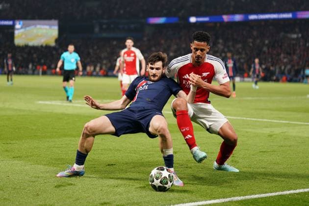 Khvicha Kvaratskhelia of PSG and William Saliba of Arsenal Paris Saint-Germain v Arsenal, UEFA Champions League, Semi Final, Second Leg, Football, Parc des Princes, Paris, France - 07 May 2025 EDITORIAL USE ONLY No use with unauthorised audio, video, data, fixture lists, club league logos or live services. Online in-match use limited to 120 images, no video emulation. No use in betting, games or single club league player publications. Copyright: xDavexWinter Shutterstockx 15288067cz