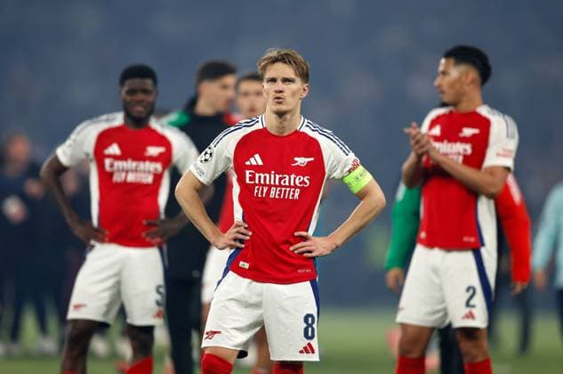 Dejected Arsenal captain Martin Odegaard at the end of the game with teammates Thomas Partey and William Saliba Paris Saint-Germain v Arsenal, Football, UEFA Champions League, Semi-Final 2nd Leg, Parc des Princes, Paris, France - 07 05 2025 Editorial use only  Copyright: xMattxImpey Shutterstockx 15289021ah