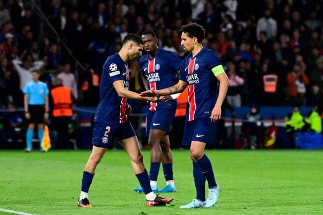 FOOTBALL : PSG vs Arsenal - Ligue des Champions - 07 05 2025 Marquinhos ( 5 - PSG ) shake hands with Achraf Hakimi ( 2 - PSG ) during the UEFA Champions League match between Paris Saint Germain and Arsenal FC at Parc Des Princes on May 07 , 2025 in Paris, France. ( Photo by Dante Badano PsnewZ ) - ParisFrance  Copyright: xx