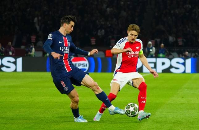 Fabian Ruiz of PSG battles with Martin Odegaard of Arsenal Paris Saint-Germain v Arsenal, UEFA Champions League, Semi Final, Second Leg, Football, Parc des Princes, Paris, France - 07 May 2025 EDITORIAL USE ONLY No use with unauthorised audio, video, data, fixture lists, club league logos or live services. Online in-match use limited to 120 images, no video emulation. No use in betting, games or single club league player publications. Copyright: xJavierxGarcia Shutterstockx 15288068gb