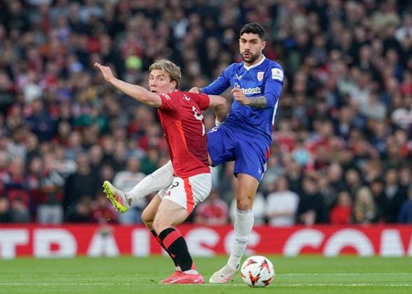 Manchester, England, 8th May 2025. Unai Nunez of Athletic Bilbao and Rasmus Hojlund of Manchester United, ManU battle for the ball during the Manchester United vs Athletic Bilbao UEFA Europa League Semi Final, 2nd Leg match at Old Trafford, Manchester. Picture credit should read: Andrew Yates Sportimage EDITORIAL USE ONLY. No use with unauthorised audio, video, data, fixture lists, club league logos or live services. Online in-match use limited to 120 images, no video emulation. No use in betting, games or single club league player publications. SPI_036_AY_MANCHESTER_UNITED_V_ATHLETIC_BILBAO SPI-3917-0036