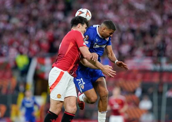 Manchester, England, 8th May 2025. Harry Maguire of Manchester United, ManU heads the ball during the Manchester United vs Athletic Bilbao UEFA Europa League Semi Final, 2nd Leg match at Old Trafford, Manchester. Picture credit should read: Andrew Yates Sportimage EDITORIAL USE ONLY. No use with unauthorised audio, video, data, fixture lists, club league logos or live services. Online in-match use limited to 120 images, no video emulation. No use in betting, games or single club league player publications. SPI_044_AY_MANCHESTER_UNITED_V_ATHLETIC_BILBAO SPI-3917-0044