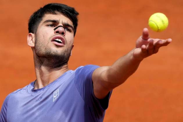 Carlos Alcaraz of Spain serves during the match against Dusan Lajovic of Serbia at the Internazionali BNL d Italia 2025 tennis tournament at Foro Italico in Rome, Italy on May 9, 2025. Carlos Alcaraz won 6-3, 6-3. AntoniettaxBaldassarre