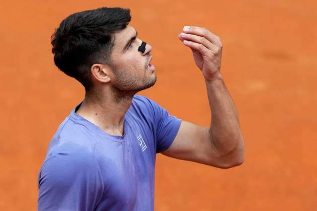 Carlos Alcaraz of Spain reacts during the match against Dusan Lajovic of Serbia at the Internazionali BNL d Italia 2025 tennis tournament at Foro Italico in Rome, Italy on May 9, 2025. Carlos Alcaraz won 6-3, 6-3. AntoniettaxBaldassarre