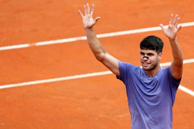Carlos Alcaraz of Spain celebrates at the end of the match against Dusan Lajovic of Serbia at the Internazionali BNL d Italia 2025 tennis tournament at Foro Italico in Rome, Italy on May 9, 2025. Carlos Alcaraz won 6-3, 6-3. AntoniettaxBaldassarre