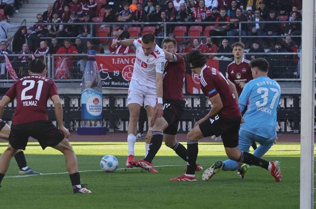 09 05 2025 Soccer Season 2024 2025 2 Soccer Bundesliga 33 Matchday 1 FC Nürnberg FCN Club 1 FC Köln Sportfoto Zink DaMa xdaxmax DFL regulations prohibit any use of photographs as image sequences and or quasi video only for editorial use Robin Knoche 31, 1 FC Nürnberg FCN vs Tim Lemperle 19, FC Köln