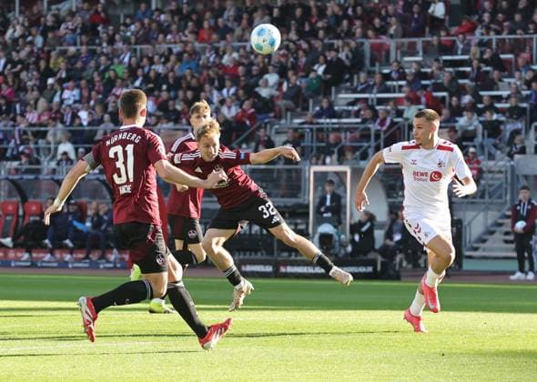 09 05 2025 Soccer season 2024 2025 2 Soccer Bundesliga 33 Matchday 1 FC Nürnberg FCN Club 1 FC Köln Sportfoto Zink DaMa xdaxmax DFL regulations prohibit any use of photographs as image sequences and or quasi video only for editorial use Tim Janisch 32, 1 FC Nürnberg FCN with header