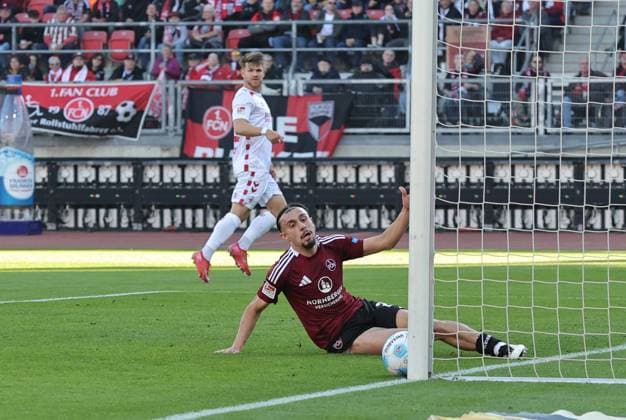 09 05 2025 Soccer Season 2024 2025 2 Soccer Bundesliga 33 Matchday 1 FC Nürnberg FCN Club 1 FC Köln Sportfoto Zink DaMa xdaxmax DFL regulations prohibit any use of photographs as image sequences and or quasi video only for editorial use Goal shot from Jan Thielmann 29, FC Köln to the post Berkay Yilmaz 21, 1 FC Nürnberg FCN tries to save