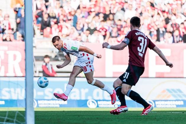 1 Soccer Bundesliga 1 FC Nuremberg 1 FC Cologne 09 05 2025 duel Tim Lemperle 1 FC Cologne, 19 , Robin Knoche 1 FC Nuremberg, 31 1 Soccer Bundesliga, 1 FC Nuremberg 1 FC Cologne, Nuremberg, Max Morlock Stadium on 09 05 2025 DFL REGULATIONS PROHIBIT ANY USE OF PHOTOGRAPHS AS IMAGE SEQUENCES AND OR QUASI VIDEO Copyright: xBEAUTIFULxSPORTS Wunderlx