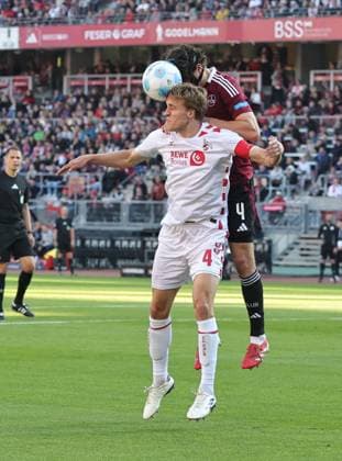 09 05 2025 Soccer season 2024 2025 2 Soccer Bundesliga 33 Matchday 1 FC Nürnberg FCN Club 1 FC Köln Sportfoto Zink DaMa xdaxmax DFL regulations prohibit any use of photographs as image sequences and or quasi video only for editorial use Timo Hübers Huebers 4, FC Köln in header duel with Fabio Gruber 4, 1 FC Nürnberg FCN