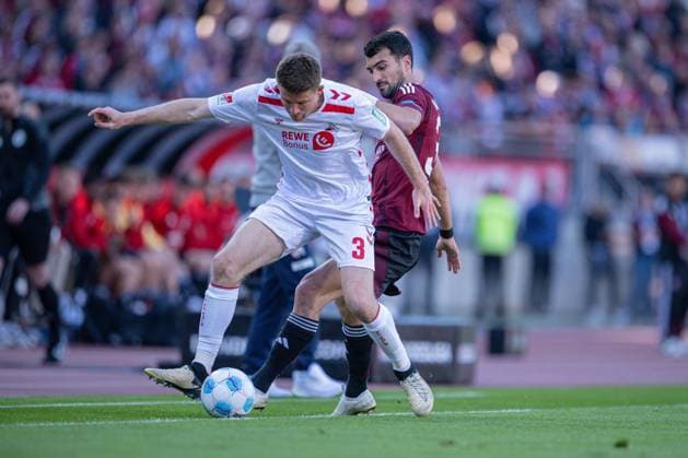 09 05 2025, Football, 2 Bundesliga, 33 Matchday Season 2024 2025, 1 FC Nürnberg 1 FC Köln, Dominique Heintz 1 FC Köln , Mahir Emreli 1 FC Nürnberg xRHR PHOTO TKx Copyright: RHR-FOTOx RHR-FOTO TK