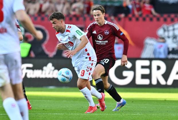 09 05 2025 Soccer Season 2024 2025 2 Soccer Bundesliga 33 Matchday 1 FC Nürnberg FCN Club 1 FC Köln Sportfoto Zink xwoxzix DFL regulations prohibit any use of photographs as image sequences and or quasi video only for editorial use Luca Waldschmidt 9, FC Köln Caspar Jander 20, 1 FC Nürnberg FCN