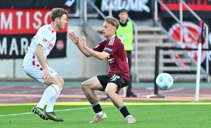 09 05 2025 Soccer Season 2024 2025 2 Soccer Bundesliga 33 Matchday 1 FC Nürnberg FCN Club 1 FC Köln Sportfoto Zink xwoxzix DFL regulations prohibit any use of photographs as image sequences and or quasi video only for editorial use Florian Kainz 11, FC Köln Tim Janisch 32, 1 FC Nürnberg FCN