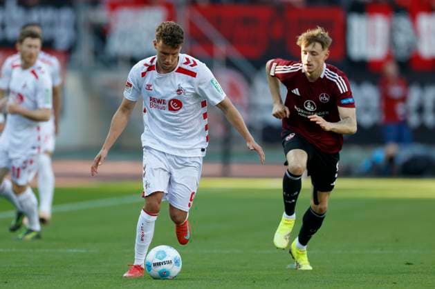 v l Luca Waldschmidt 1 FC Koeln, 9 and Tim Drexler 1 FC Nuernberg, 5 , 09 05 2025, Football, 2 Bundesliga, 1 FC Nürnberg 1 FC Köln, GER, Nuernberg, Max Morlock Stadion, DFL REGULATIONS PROHIBIT ANY USE OF PHOTOGRAPHS AS IMAGE SEQUENCES AND OR QUASI VIDEO Copyright: HMBxMedia xHeikoxBecker