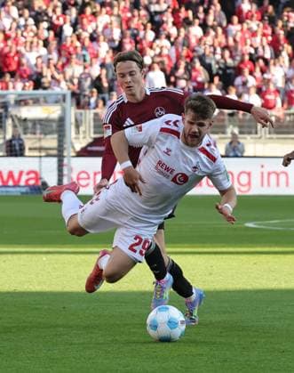 09 05 2025 Soccer Season 2024 2025 2 Soccer Bundesliga 33 Matchday 1 FC Nürnberg FCN Club 1 FC Köln Sportfoto Zink DaMa xdaxmax DFL regulations prohibit any use of photographs as image sequences and or quasi video only for editorial use Caspar Jander 20, 1 FC Nürnberg FCN with foul on Jan Thielmann 29, FC Köln