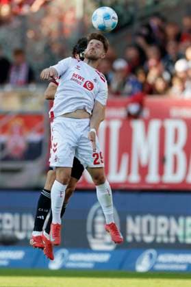 Header duel between Fabio Gruber 1 FC Nuernberg, 4 l and Jan Thielmann 1 FC Koeln, 29 09 05 2025, Soccer, 2 Bundesliga, 1 FC Nürnberg 1 FC Köln, GER, Nuernberg, Max Morlock Stadion, DFL REGULATIONS PROHIBIT ANY USE OF PHOTOGRAPHS AS IMAGE SEQUENCES AND OR QUASI VIDEO Copyright: HMBxMedia xHeikoxBecker